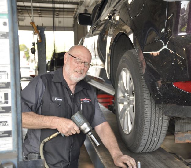 frank installing a new tire